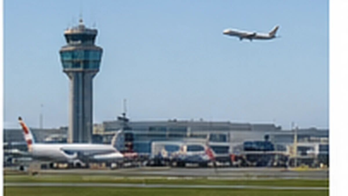Airport control tower with an airliner on approach